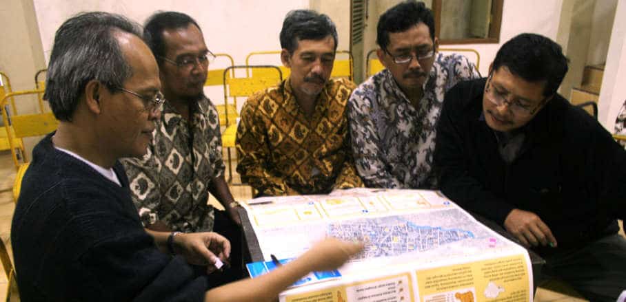 People participate in Musrenbang using the information tool 'Mini Atlas' to understand issues in their neighbourhood