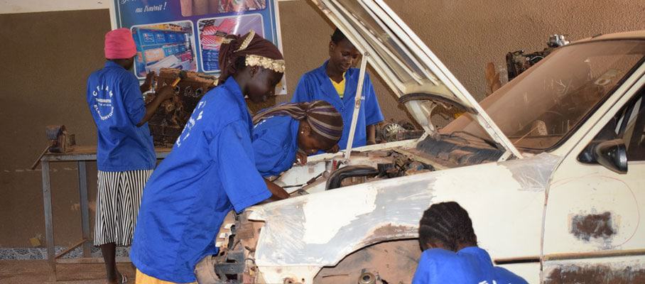 Participants learn how to fix a car